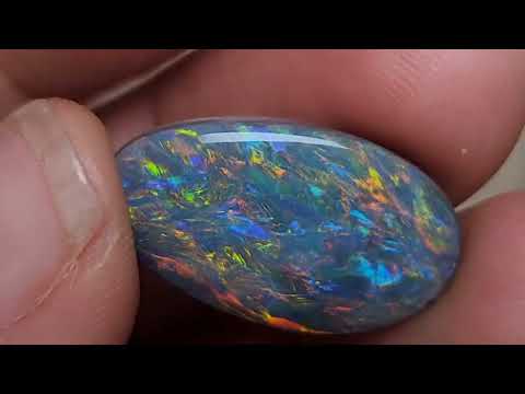 8.24 FEATHERS IN FULL COLORS BLACK OPAL STONE FROM LIGHTNING RIDGE