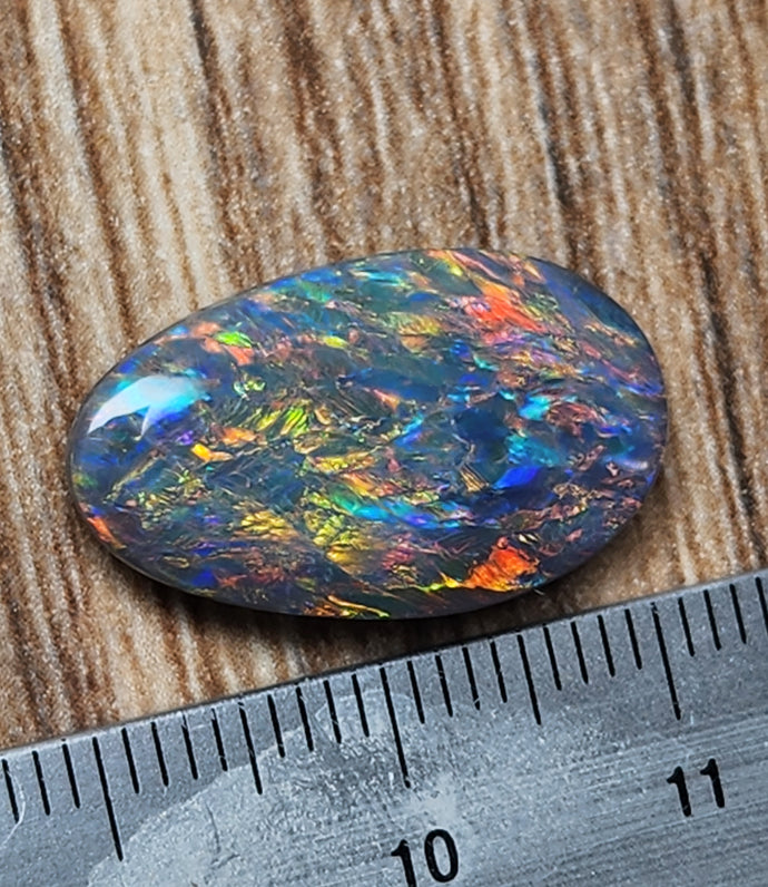 8.24 FEATHERS IN FULL COLORS BLACK OPAL STONE FROM LIGHTNING RIDGE