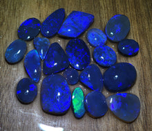 Load image into Gallery viewer, AAA GRADE BLACK OPAL ROUGH RUBBED SEMIFINISHED  CARATS
