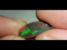 Load and play video in Gallery viewer, LAVISH BLACK OPAL STONE FROM LIGHTNING RIDGE
